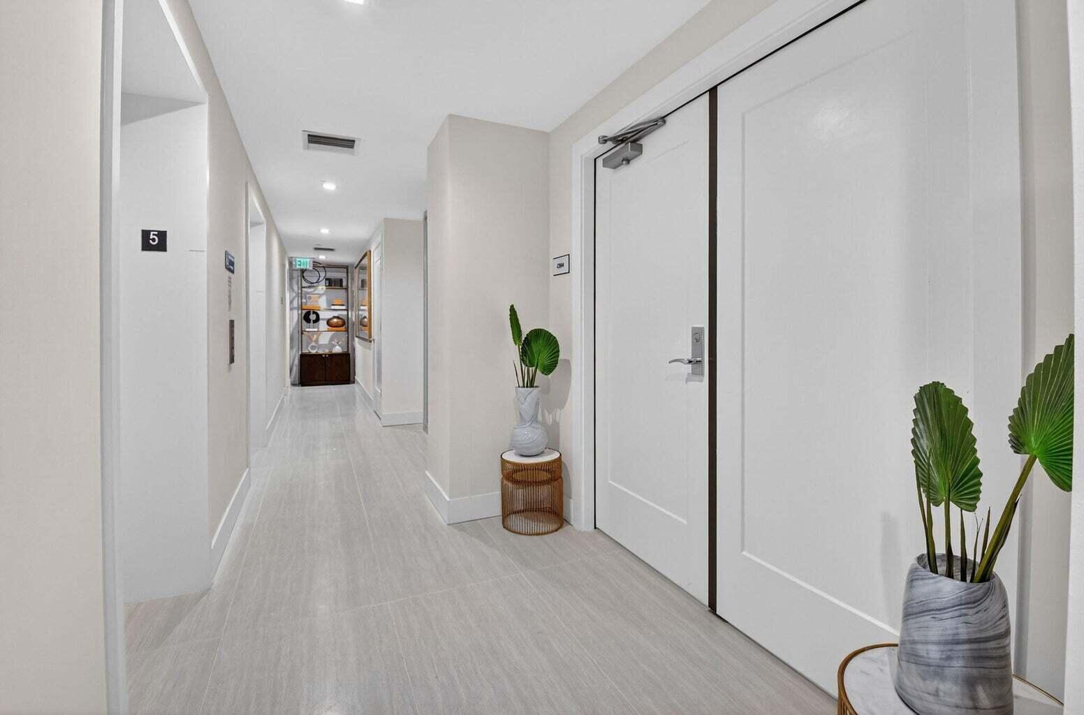 20155 Boca W Drive, Unit C504 Boca Raton, FL 33434 - Photo 27 of 41 Entrance off elevator