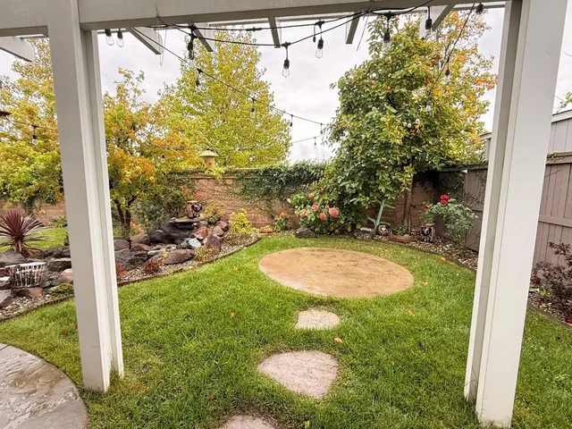 a view of a room with a small yard