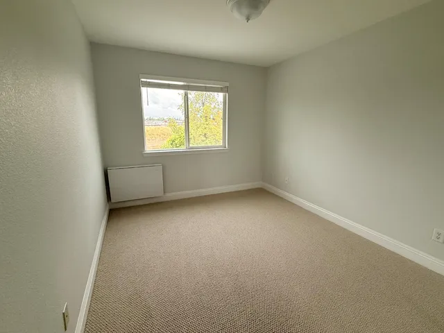 an empty room with a window