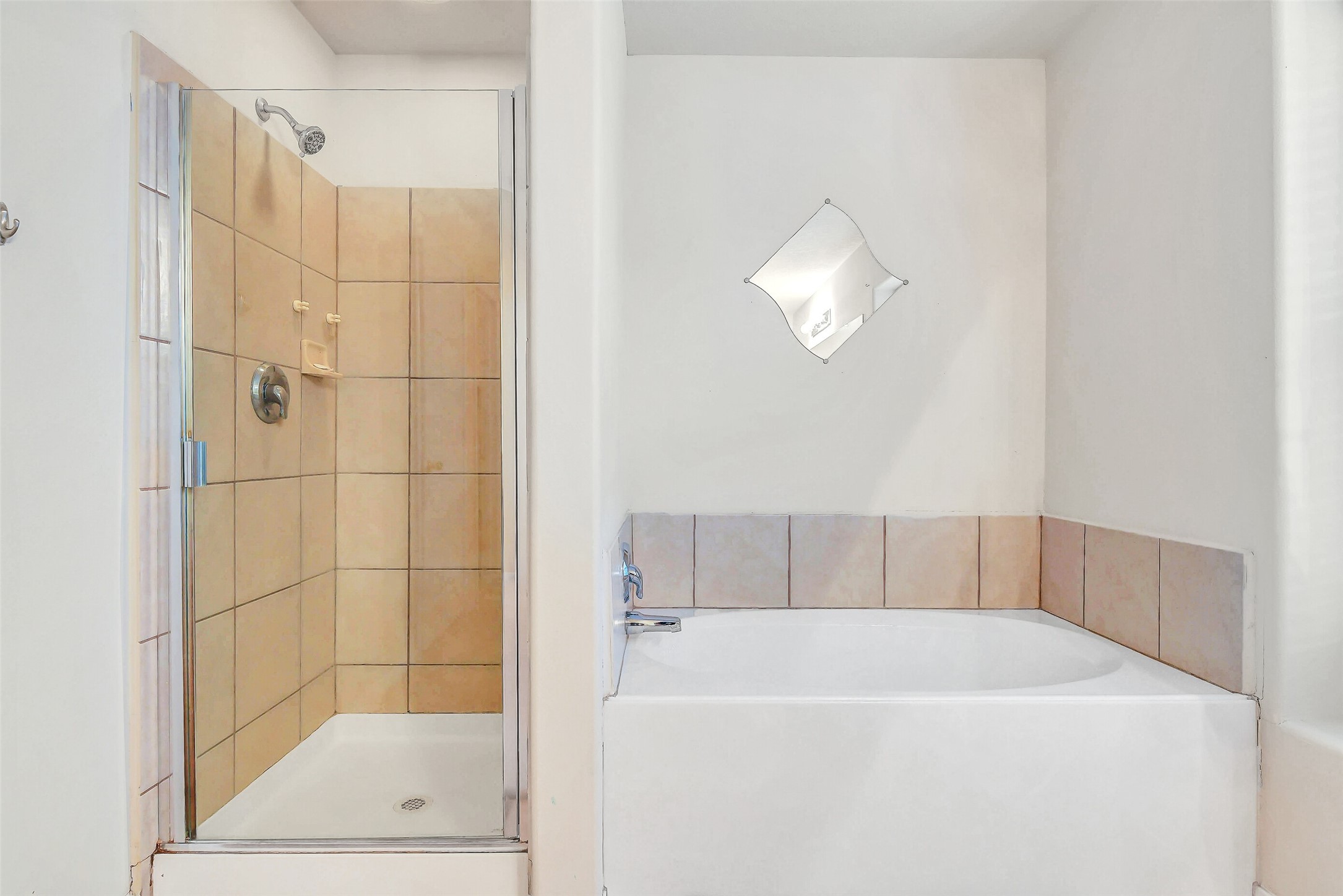 3407 Apple Dale Drive Houston, TX 77084 - Photo 22 of 37 a bathroom with a bathtub and a shower