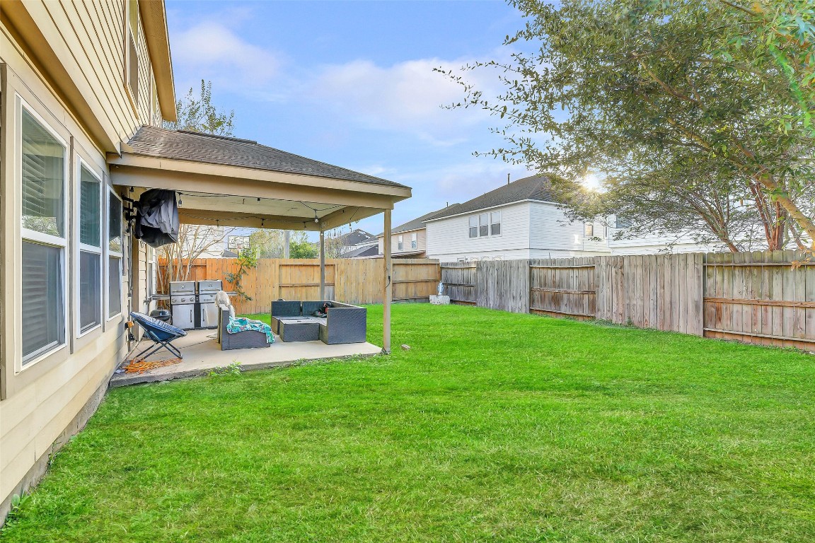 3407 Apple Dale Drive Houston, TX 77084 - Photo 35 of 37 a view of a house with backyard and porch