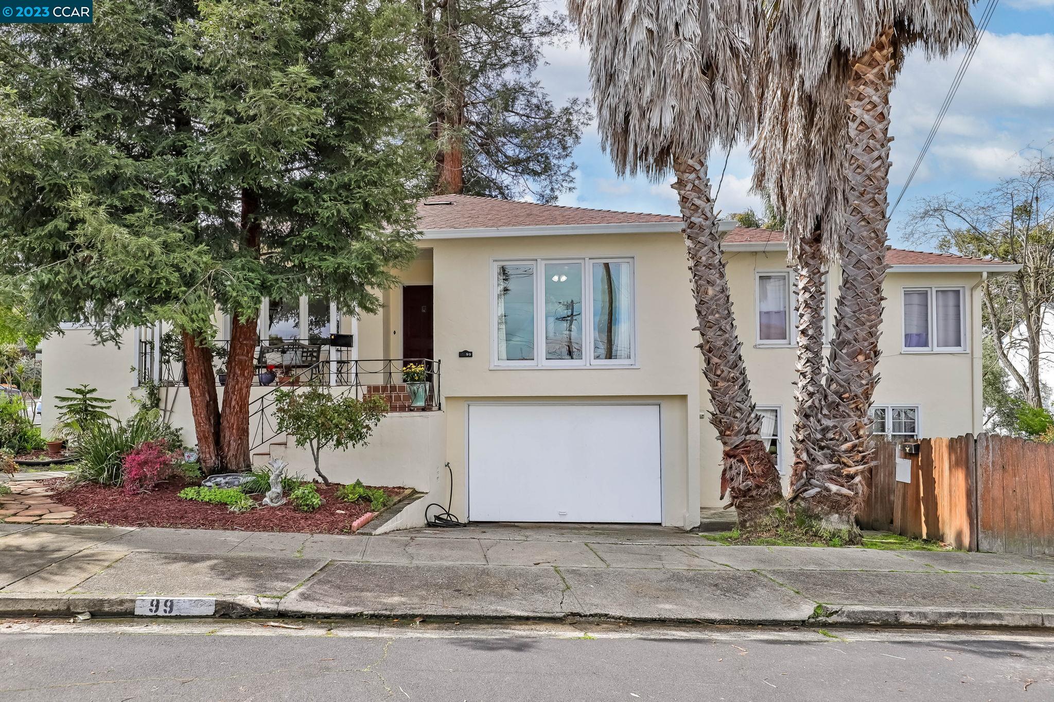 99 Mahoney Street Rodeo, CA 94572 - Photo 1 of 1 front view of house with a tree
