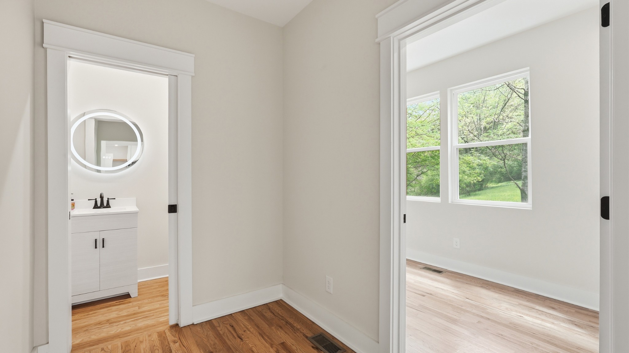 2005 Beaver Ridge Road White Bluff, TN 37187 - Photo 21 of 46 a view of a hallway with wooden floor and a closet