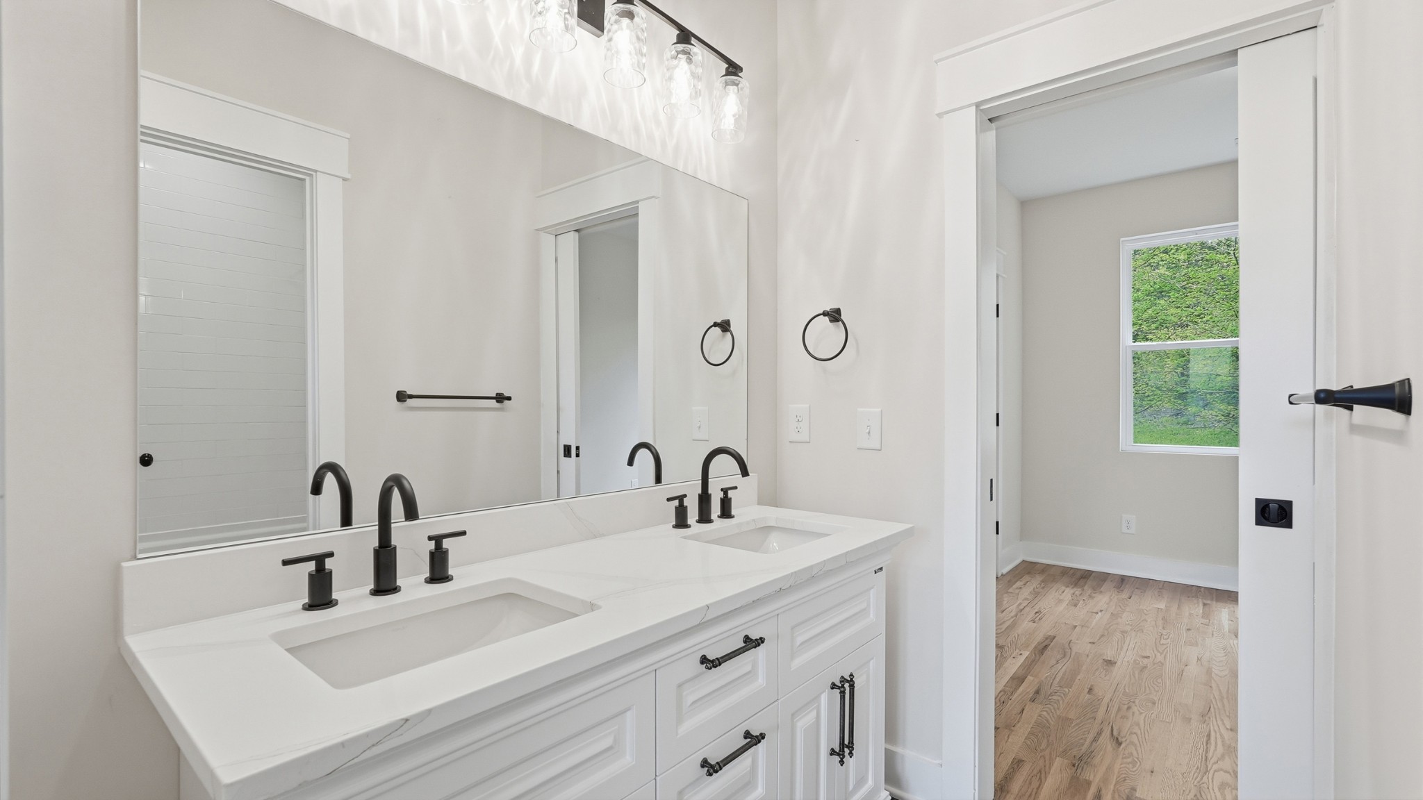 2005 Beaver Ridge Road White Bluff, TN 37187 - Photo 36 of 46 a bathroom with double vanity sink and a mirror