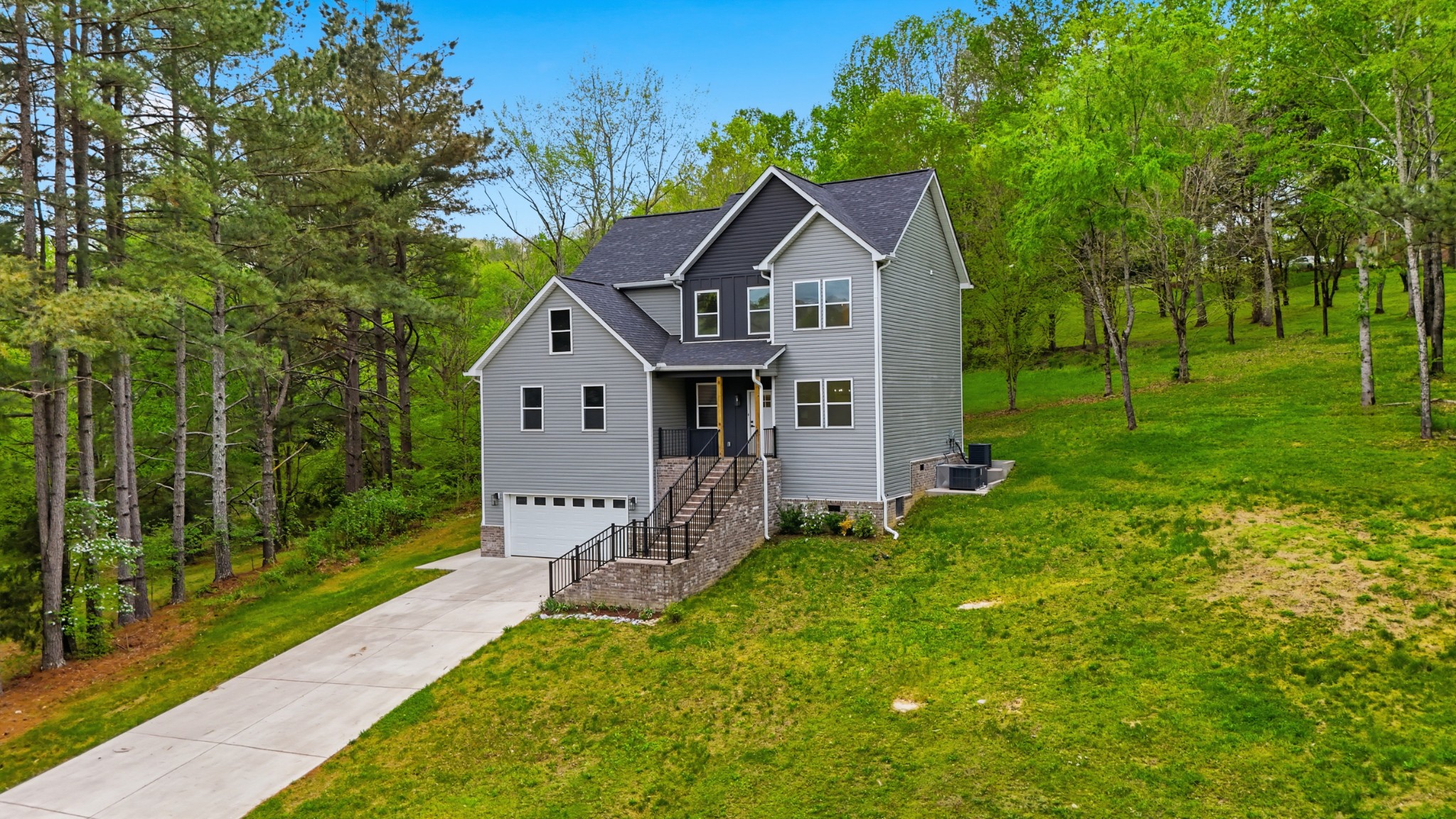 2005 Beaver Ridge Road White Bluff, TN 37187 - Photo 46 of 46 a front view of a house with yard and green space