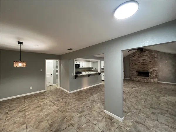 a view of a livingroom with a fireplace