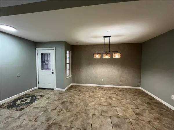 a view of a room with a chandelier