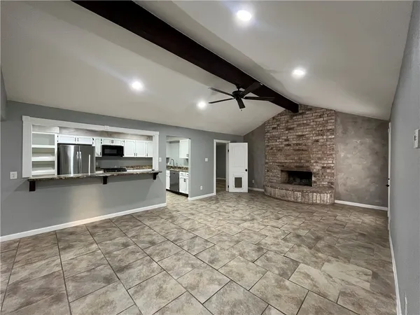 a view of a livingroom with a fireplace