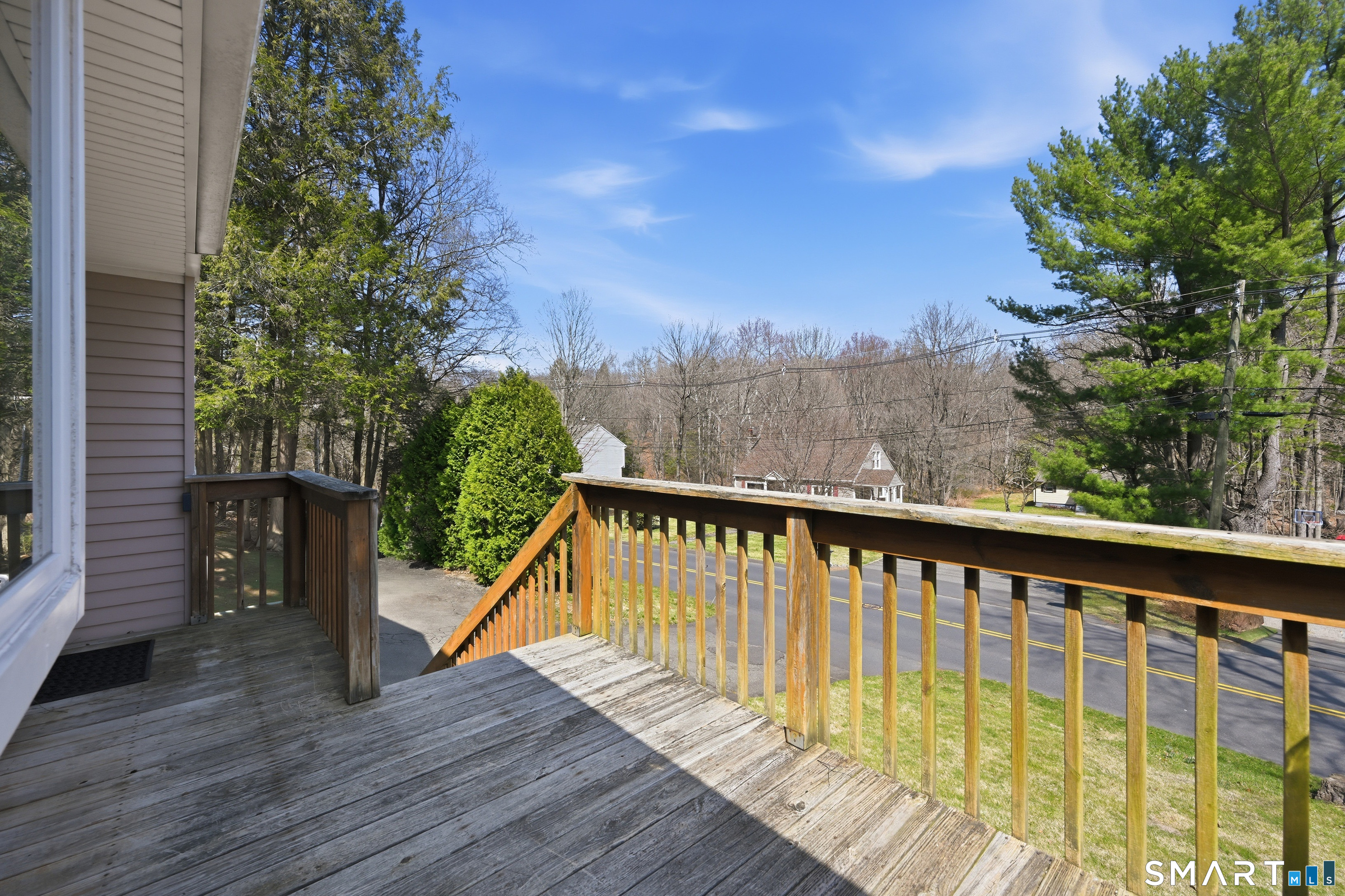 114 Beacon Valley Road Beacon Falls, CT 06403 - Photo 35 of 38 a view of balcony with wooden floor and fence