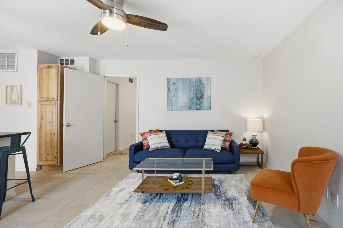 104 West 35th Street, Unit 2 Austin, TX 78705 - Photo 1 of 1 a living room with furniture and a wooden floor