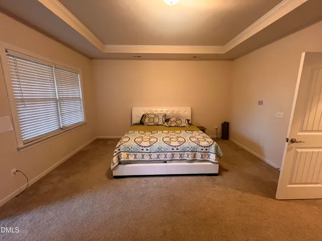 a picture of a book and a bed