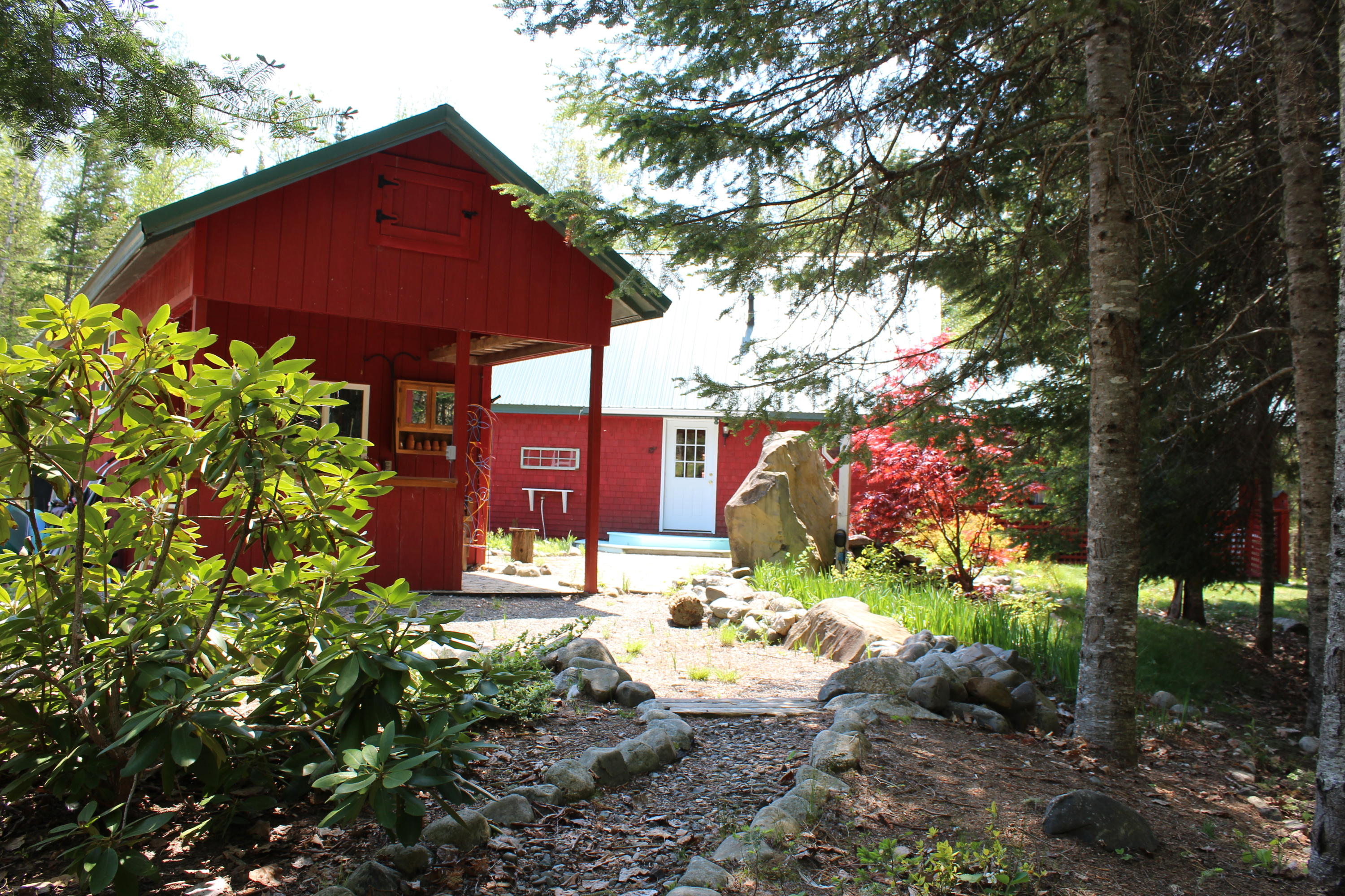 1136 Seboeis Road Howland, ME 04448 - Photo 26 of 37 path lead to shed