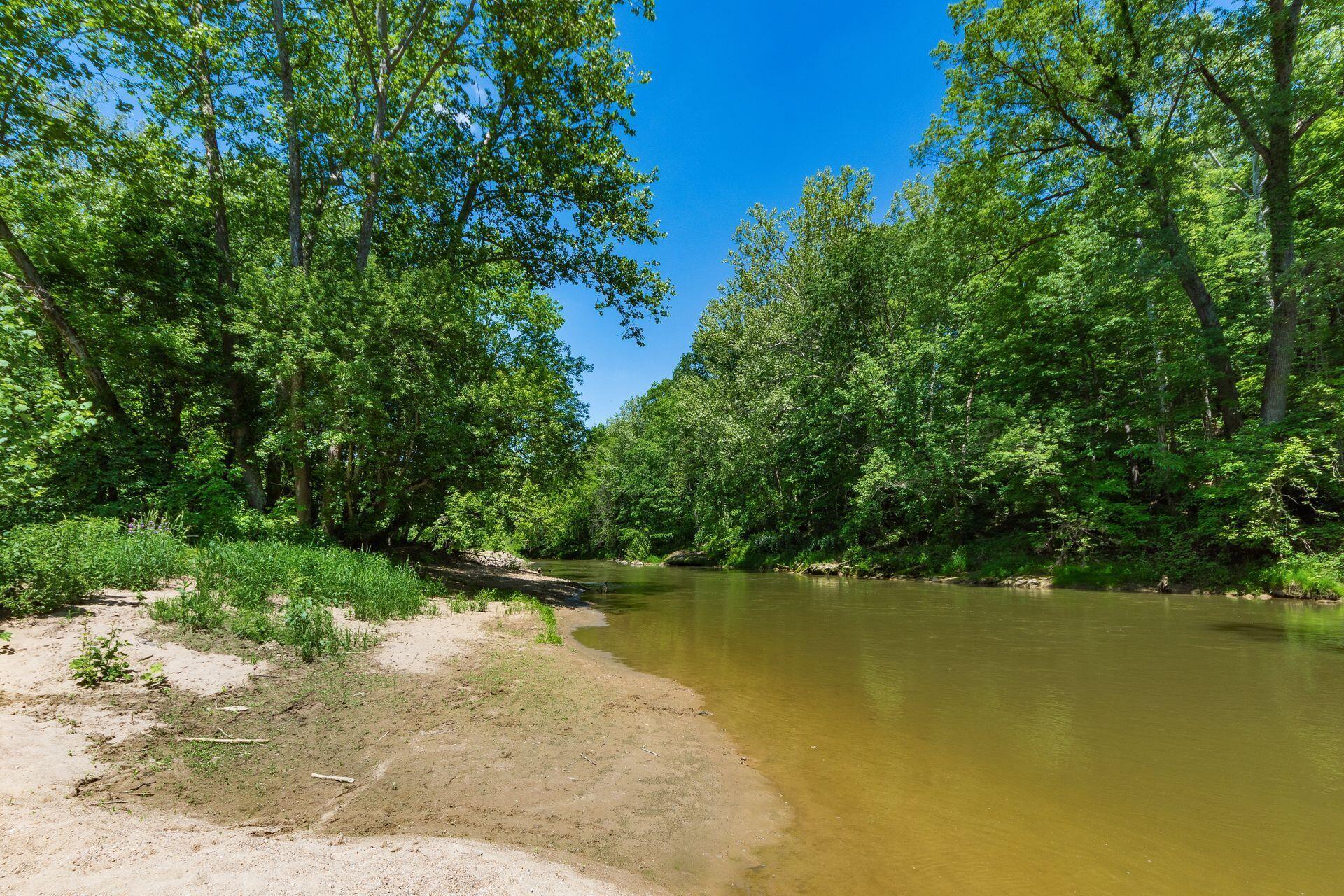 11444 Hazel Dell Road Howard, OH 43028 - Photo 7 of 41 This property flanks the river providing a beautiful backdrop in all 4 seasons.