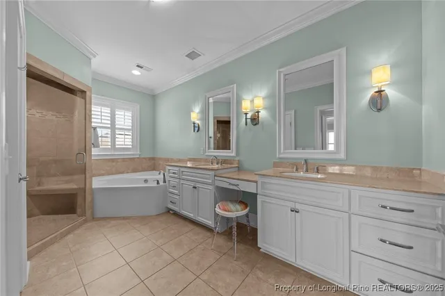 a large bathroom with a granite countertop sink mirror and a bathtub