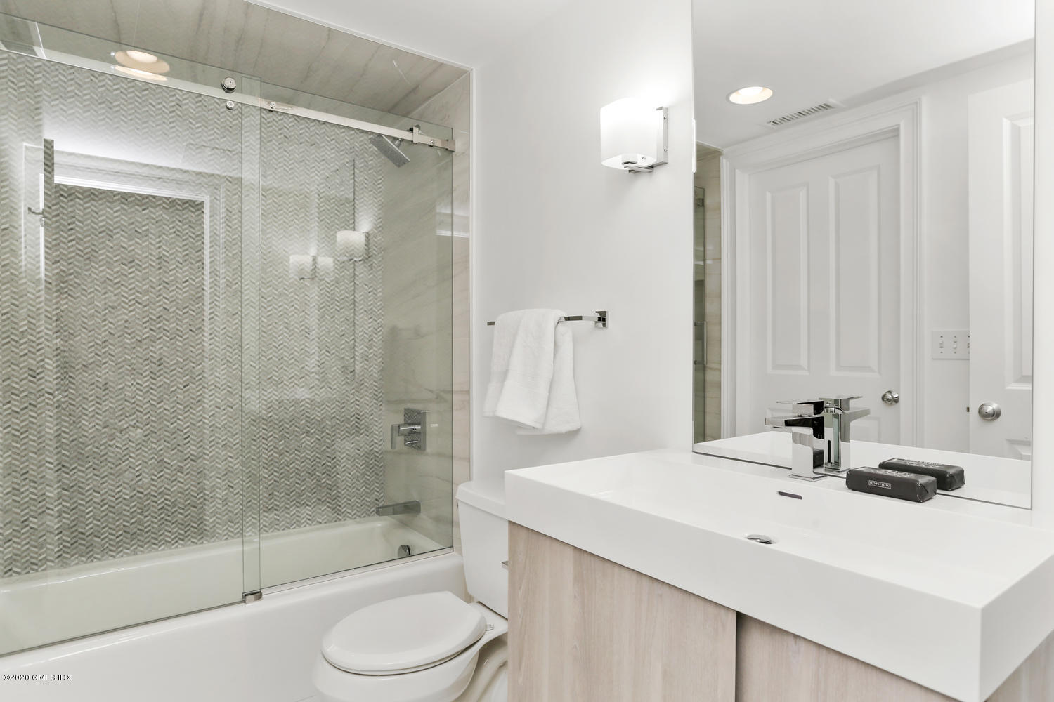 28 Welwyn Road Riverside, CT 06878 - Photo 25 of 32 a bathroom with a sink toilet and shower