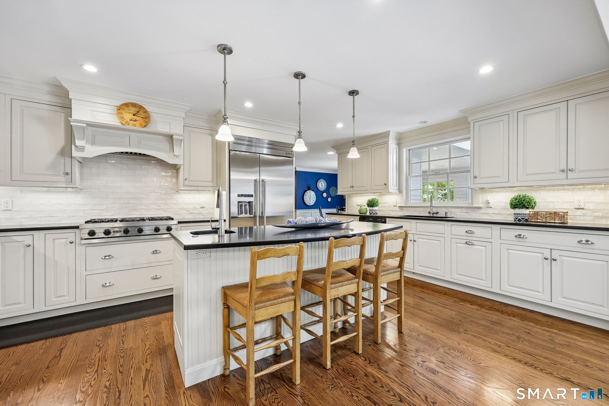 72 Strawberry Hill Road Madison, CT 06443 - Photo 10 of 40 The kitchen is awesome! Soapstone countertops, tiled backsplash and lighting and a center island are just a few of the lovely details