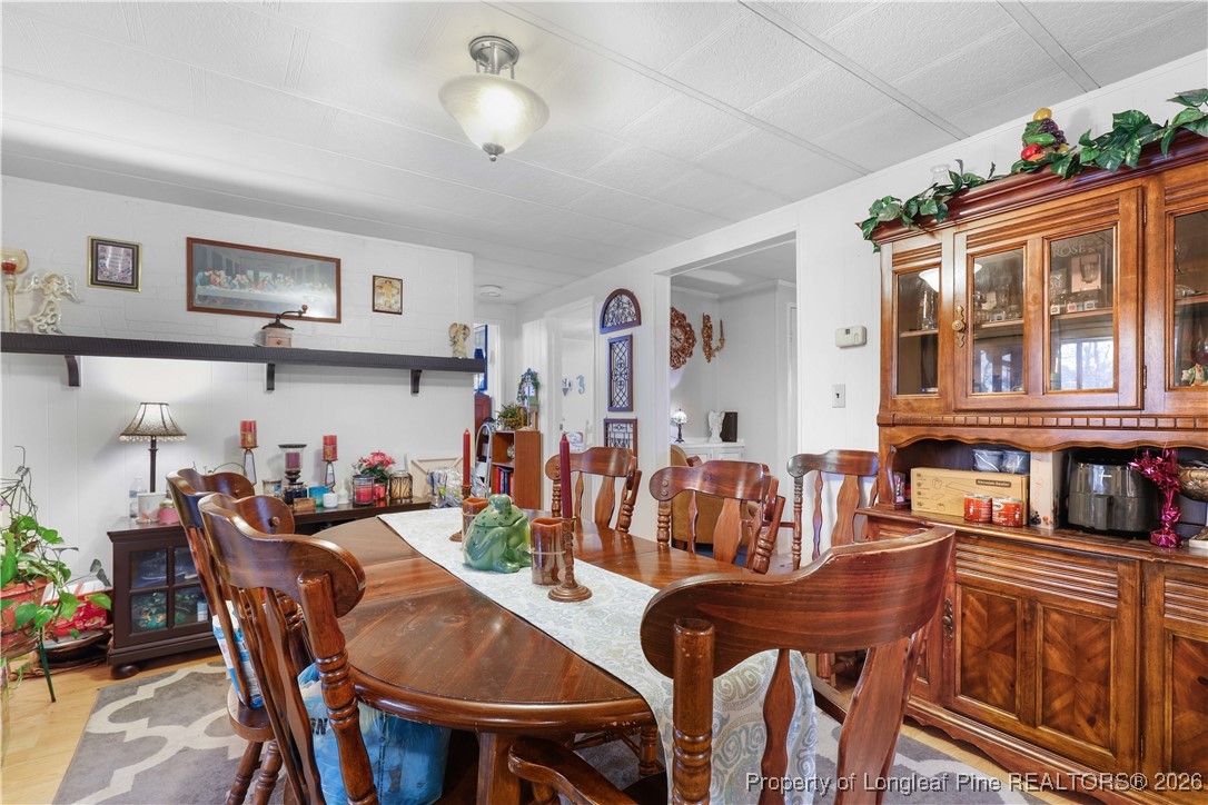 156 Connell Road Carthage, NC 28327 - Photo 5 of 43 a view of a dining room with furniture