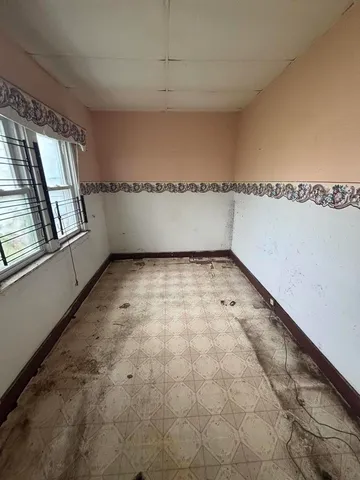 a view of an empty room with window