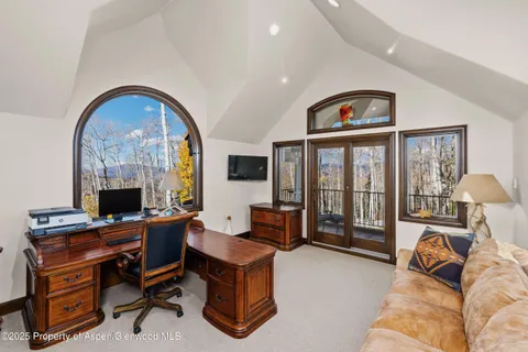 a view of balcony with furniture