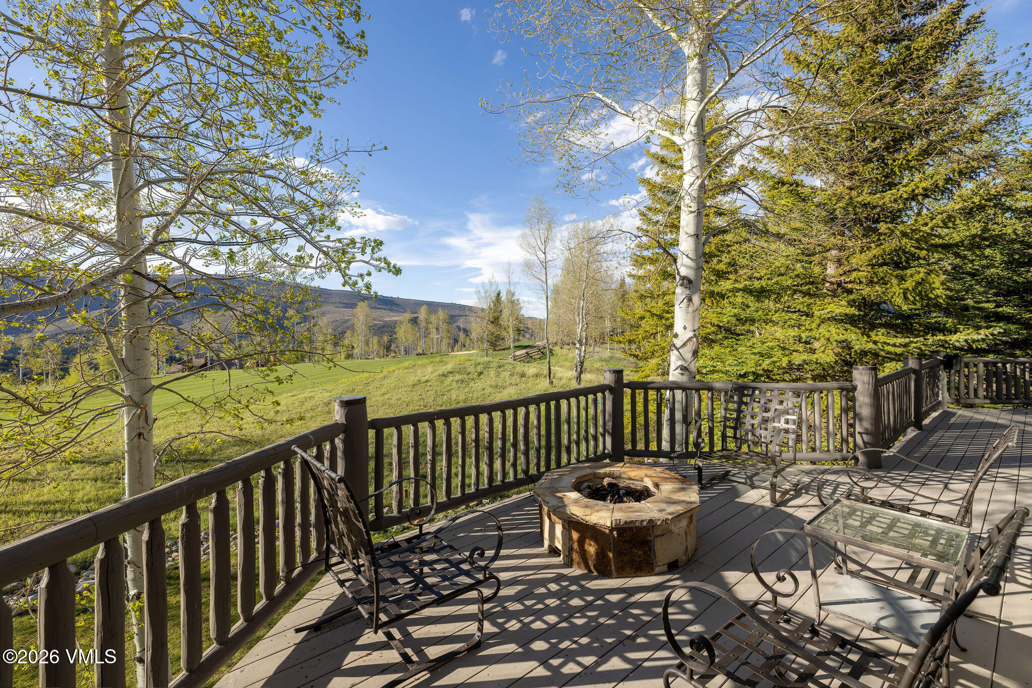 102 Saddle Ridge Loop Edwards, CO 81632 - Photo 18 of 29 a view of a chairs and table in the balcony