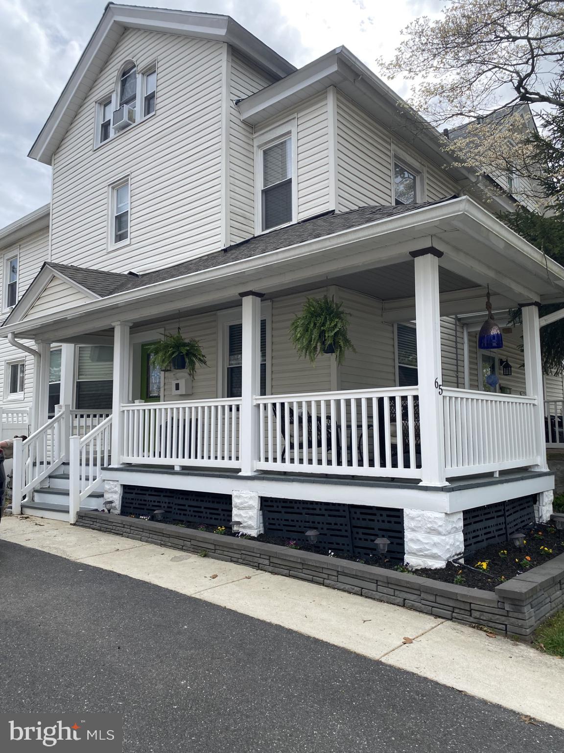 65 Arbutus Avenue Pitman, NJ 08071 - Photo 1 of 28 a view of a house with a deck