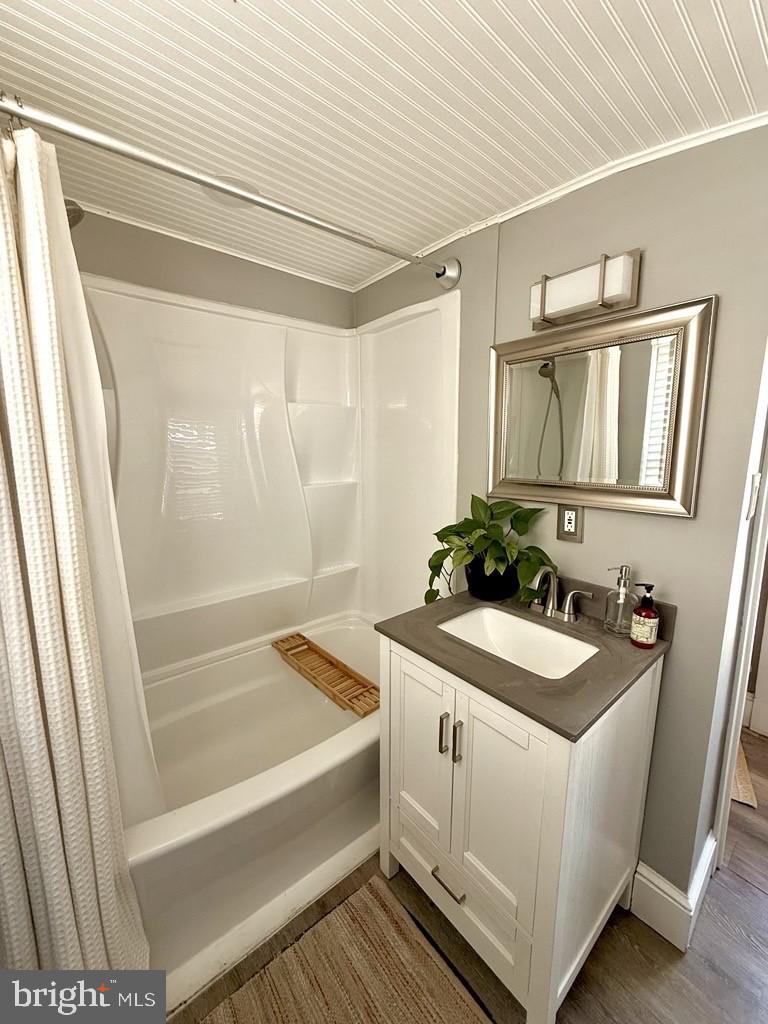65 Arbutus Avenue Pitman, NJ 08071 - Photo 14 of 28 a bathroom with a sink and a bathtub