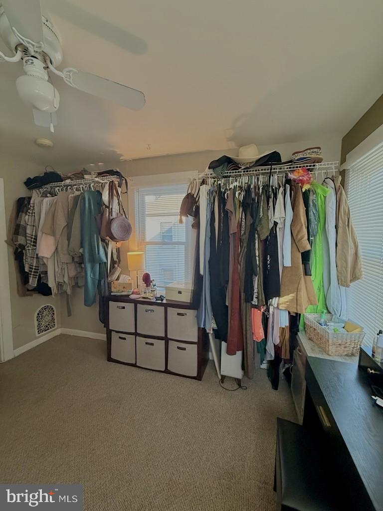 65 Arbutus Avenue Pitman, NJ 08071 - Photo 17 of 28 a view of walk in closet with clothes and shoes