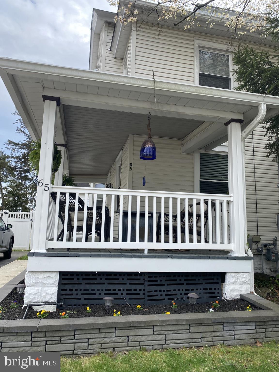 65 Arbutus Avenue Pitman, NJ 08071 - Photo 2 of 28 a view of a house with a small deck
