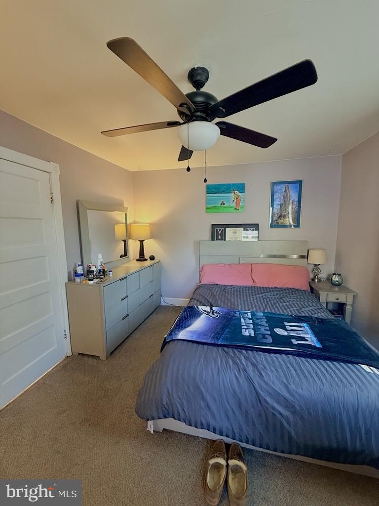 65 Arbutus Avenue Pitman, NJ 08071 - Photo 23 of 28 a bedroom with a bed and a dresser