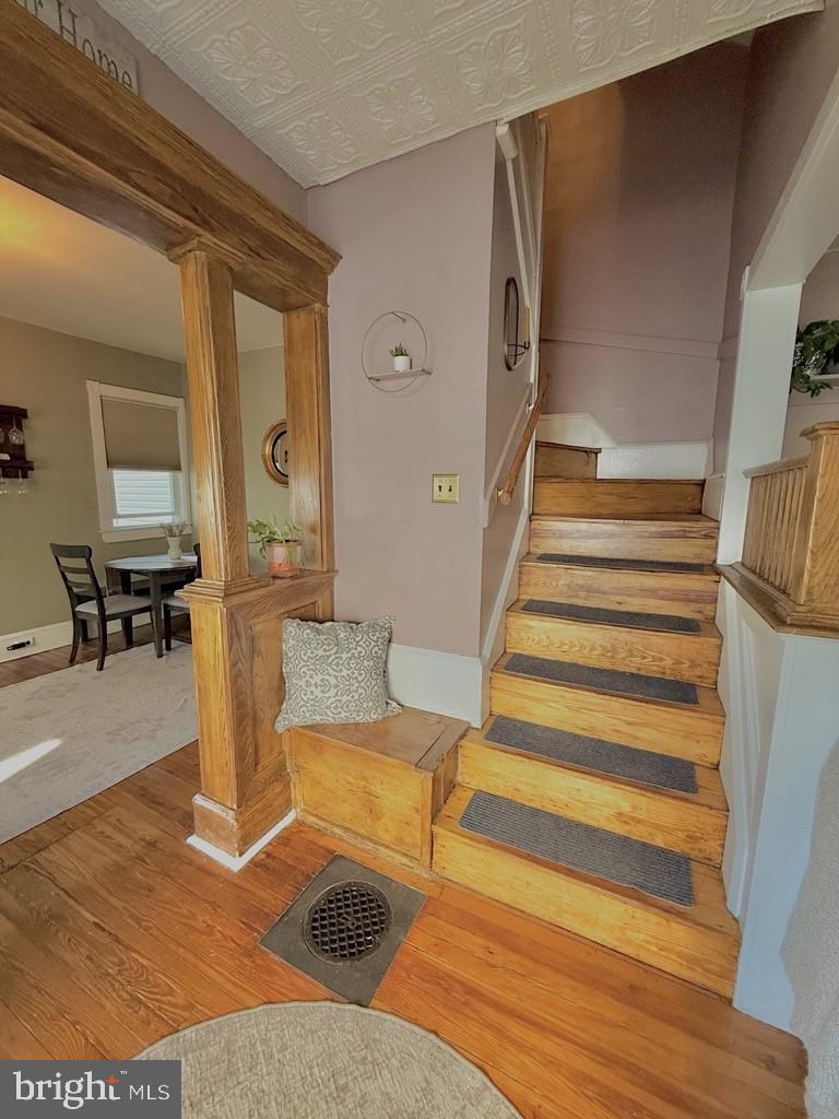65 Arbutus Avenue Pitman, NJ 08071 - Photo 5 of 28 a view of living room filled with furniture and wooden floor