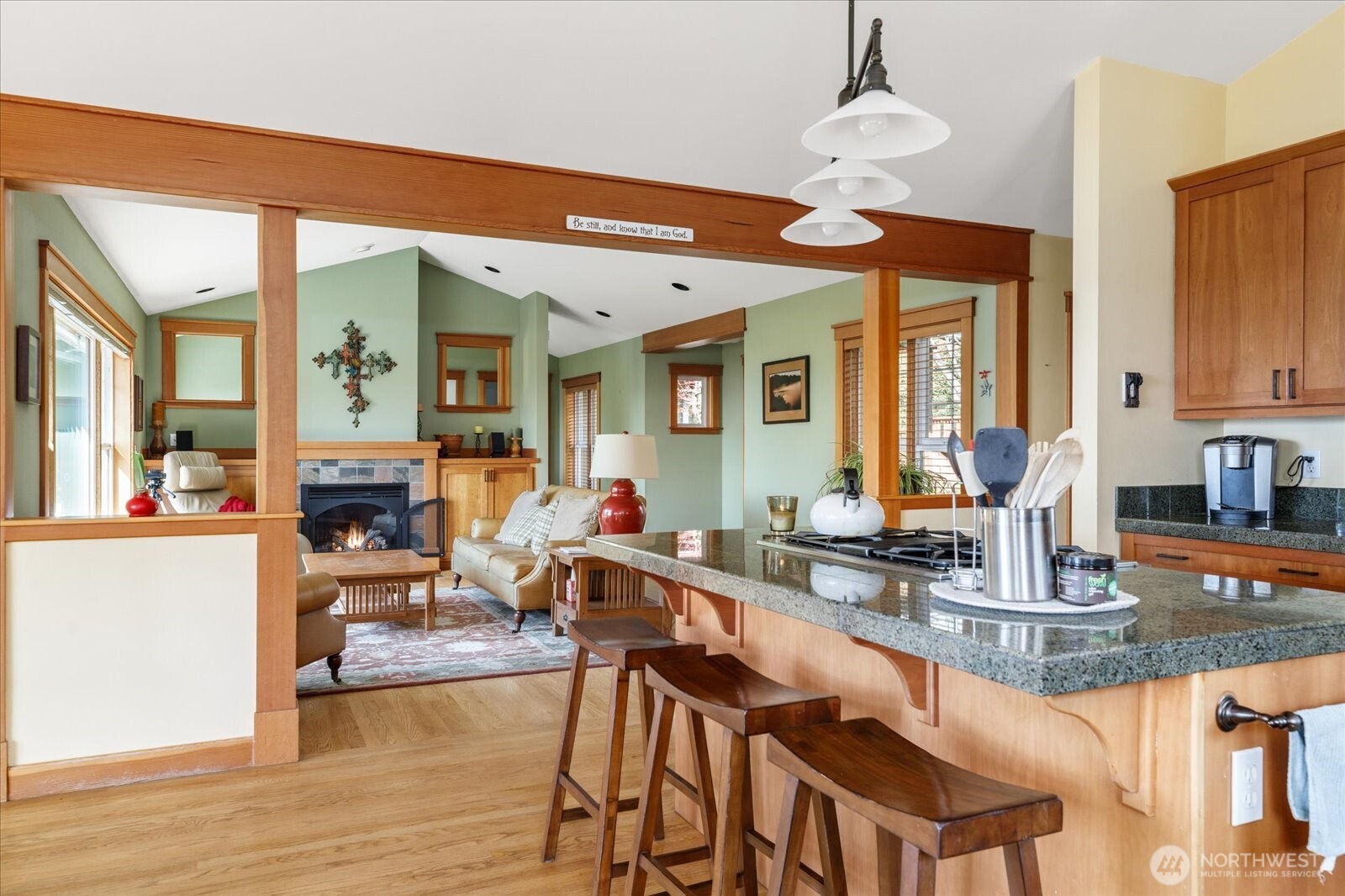 8210 Nob Road Clinton, WA 98236 - Photo 15 of 40 a kitchen with granite countertop lots of counter top space and living room