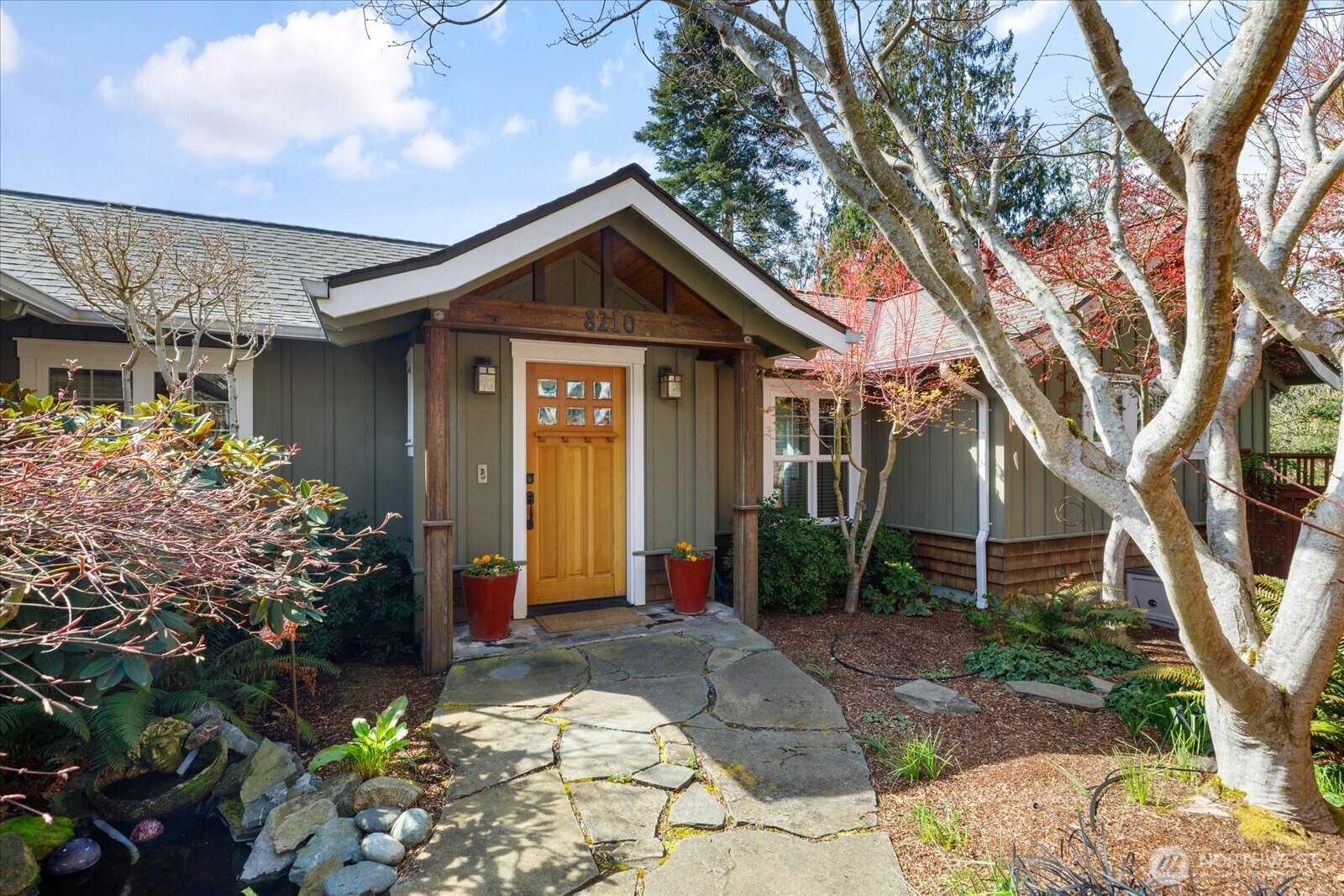 8210 Nob Road Clinton, WA 98236 - Photo 2 of 40 a front view of a house with garden