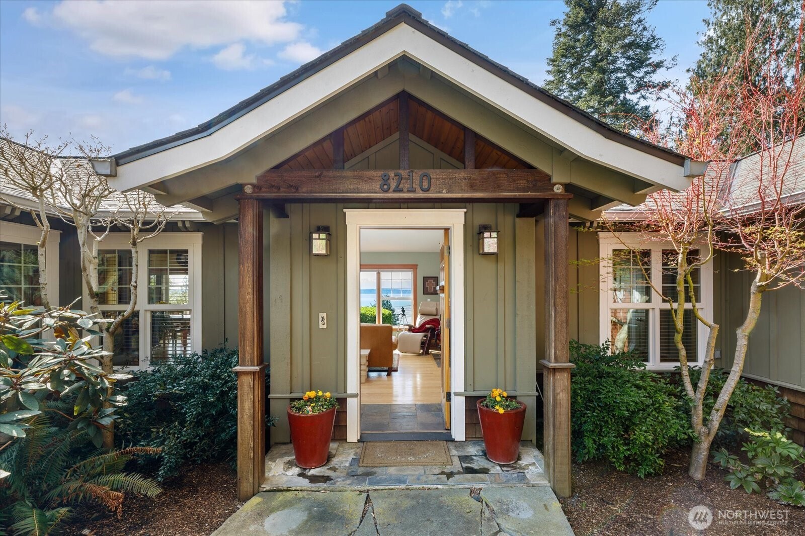 8210 Nob Road Clinton, WA 98236 - Photo 3 of 40 a front view of a house with garden