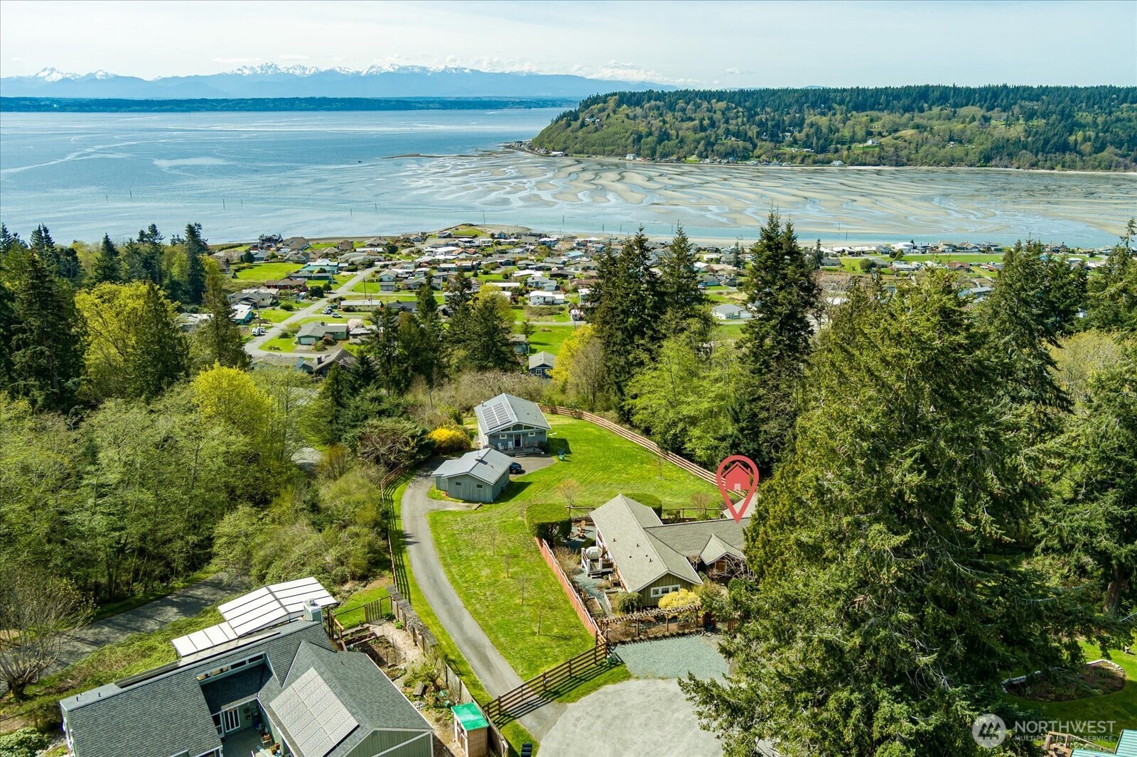 8210 Nob Road Clinton, WA 98236 - Photo 38 of 40 a view of a lake with a mountain