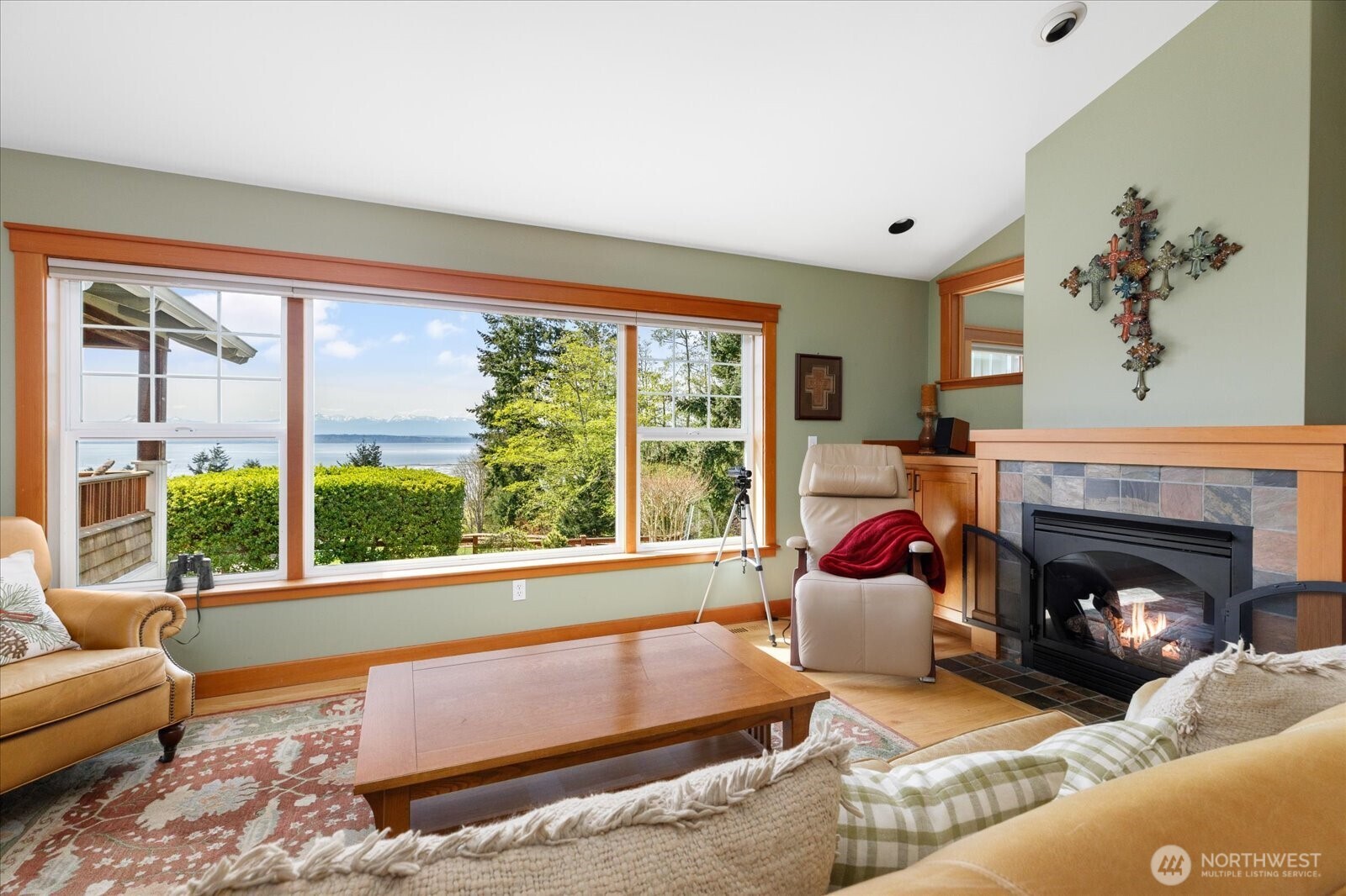 8210 Nob Road Clinton, WA 98236 - Photo 4 of 40 a living room with furniture and a fireplace