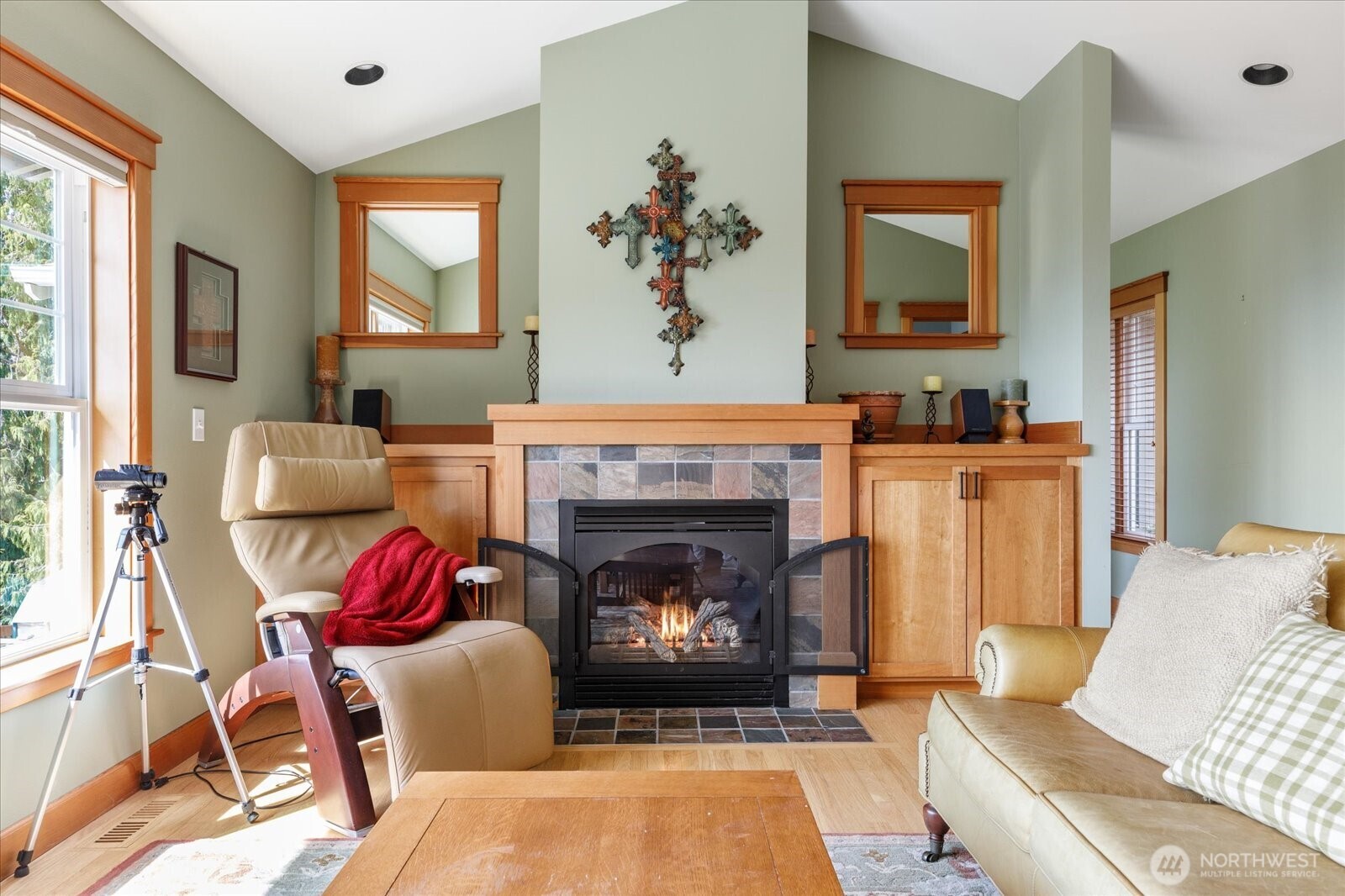 8210 Nob Road Clinton, WA 98236 - Photo 5 of 40 a living room with furniture and a fireplace