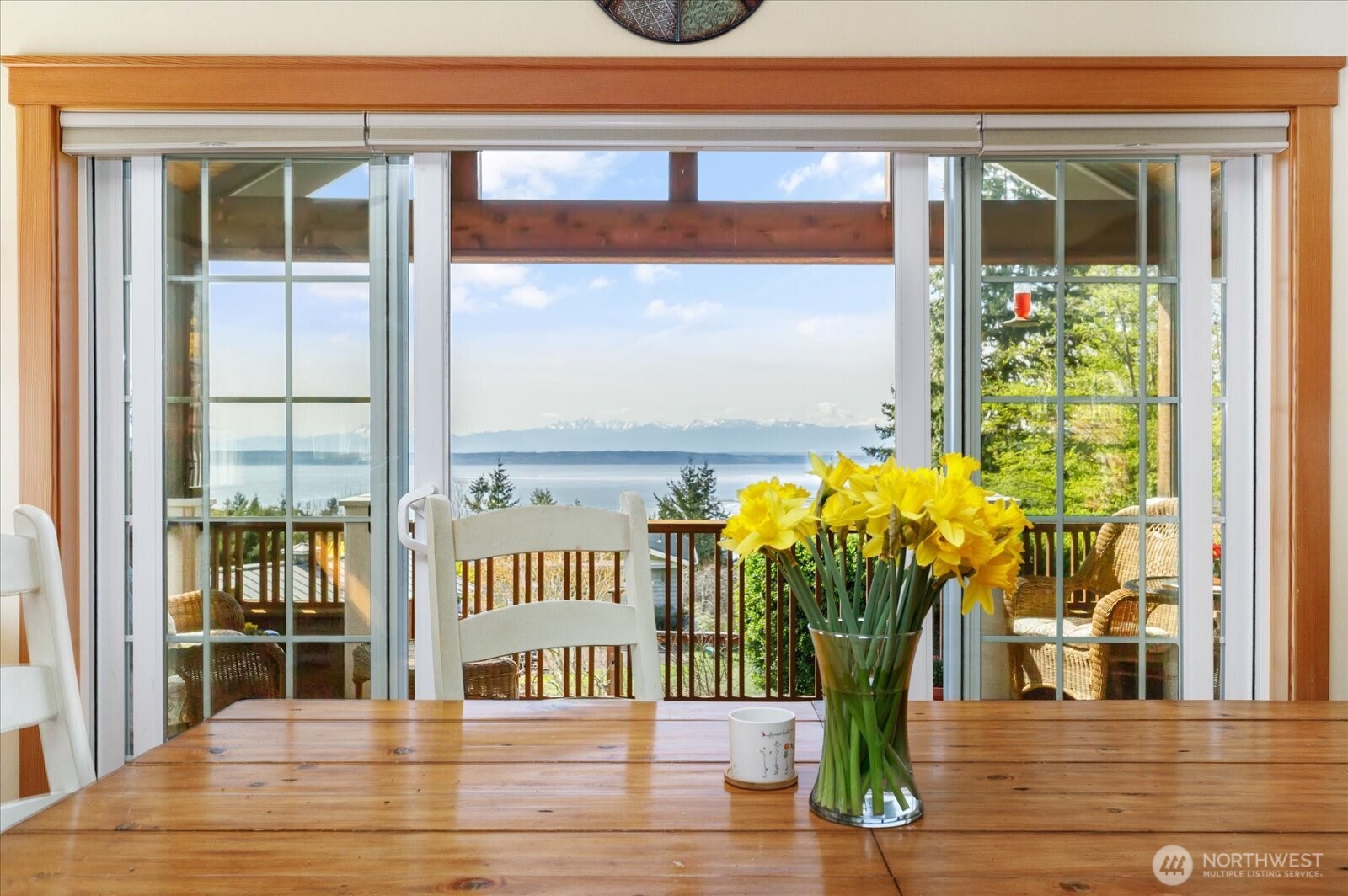 8210 Nob Road Clinton, WA 98236 - Photo 9 of 40 a front view of a house with a garden