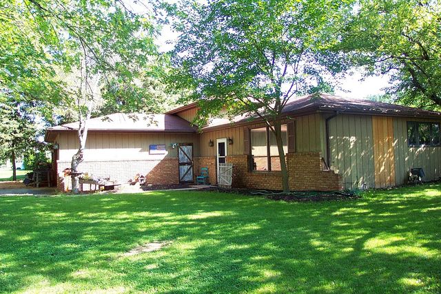 320 Kay Street Manhattan, IL 60442 - Photo 2 of 27 a view of a house with a yard