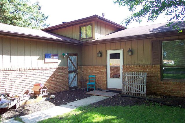 320 Kay Street Manhattan, IL 60442 - Photo 24 of 27 a view of a house with a yard