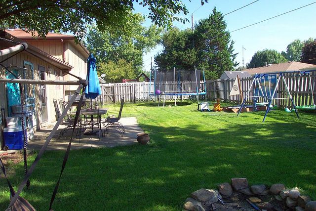 320 Kay Street Manhattan, IL 60442 - Photo 4 of 27 a view of a house with backyard and sitting area