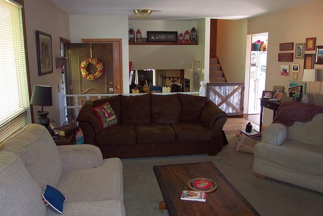 320 Kay Street Manhattan, IL 60442 - Photo 6 of 27 a living room with furniture and a fireplace