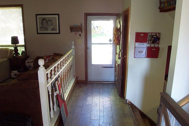 320 Kay Street Manhattan, IL 60442 - Photo 8 of 27 a view of an entryway with wooden floor