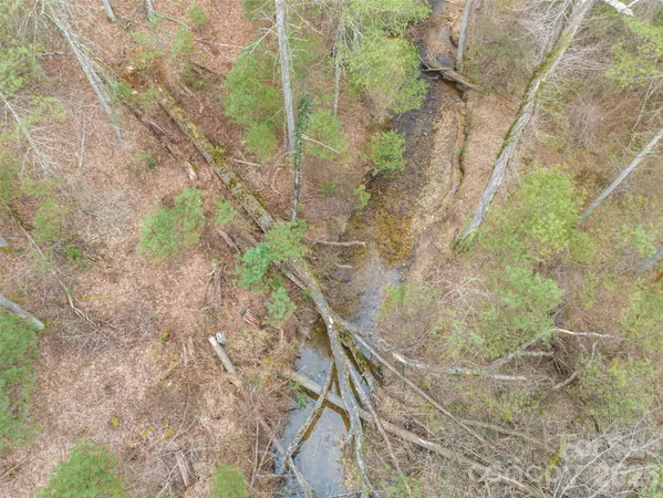 a view of a lake with a big yard