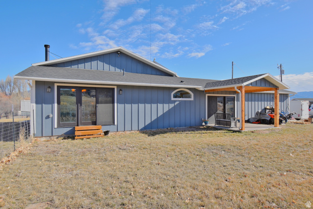 656 South Bullion Canyon Road Marysvale, UT 84750 - Photo 33 of 57 Rear view of house with a shingled roof, board and batten siding, and entry steps