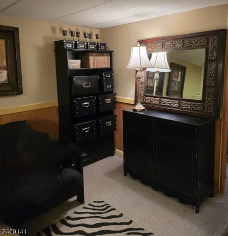 a kitchen with a refrigerator and cabinets