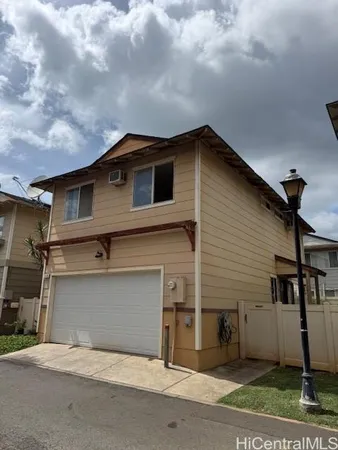 a house view with a backyard space