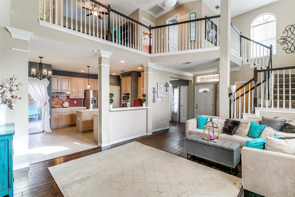 227 Moss Hill Road Irving, TX 75063 - Photo 6 of 27 a living room with furniture and a dining table