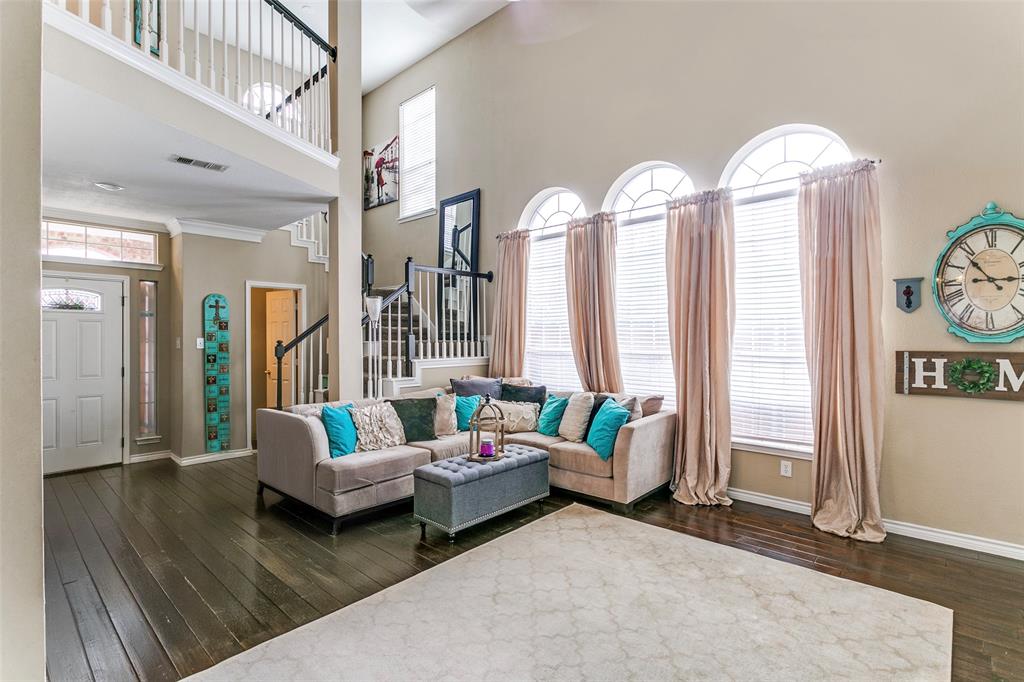 227 Moss Hill Road Irving, TX 75063 - Photo 7 of 27 a living room with furniture and large windows