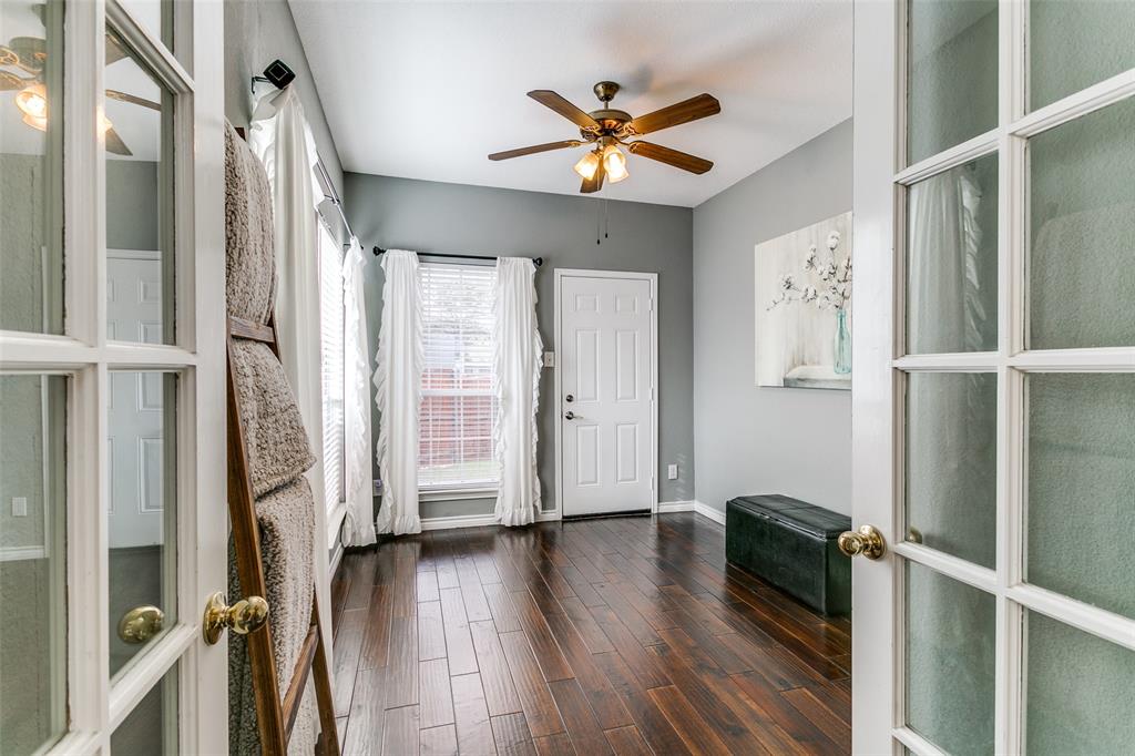 227 Moss Hill Road Irving, TX 75063 - Photo 8 of 27 a view of entryway with wooden floor
