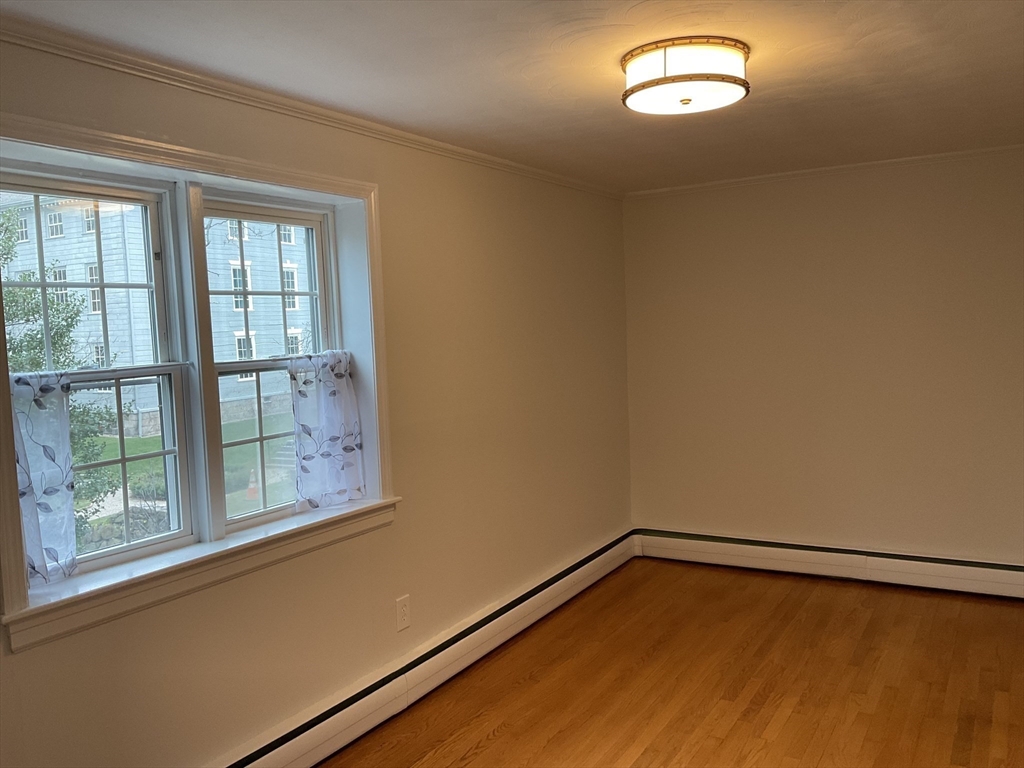 26 Summer Street, Unit 8 Marblehead, MA 01945 - Photo 12 of 23 a view of empty room with window
